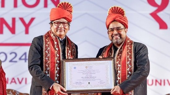 Shankar Mahadevan (right) receives the doctorate from Dr Vijay Patil, Chancellor & President, DY Patil University