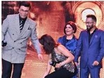 Karan Johar reacts as Samantha Ruth Prabhu tries to touch his feet at an event. Karan Johar reacts as Samantha Ruth Prabhu tries to touch his feet at an event.
