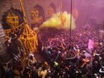 Embark on a journey through India's vibrant Holi celebrations at its iconic temples. Embark on a journey through India's vibrant Holi celebrations at its iconic temples.