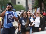 FILE PHOTO: Supporters of U.S. President Joe Biden's s plans for student debt relief march near the White House after a U.S. Supreme Court decision blocking the president's plan to cancel $430 billion in student loan debt, in Washington, U.S. June 30, 2023. REUTERS/Leah Millis/File Photo
