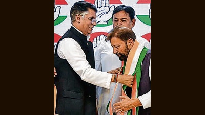 Former Congress leader Choudhary Lal Singh rejoins the grand old party in the presence of Pawan Khera and Jammu and Kashmir party president Vikar Rasool Wani, at AICC headquarters in New Delhi on Wednesday. (ANI) Former Congress leader Choudhary Lal Singh rejoins the grand old party in the presence of Pawan Khera and Jammu and Kashmir party president Vikar Rasool Wani, at AICC headquarters in New Delhi on Wednesday. (ANI)