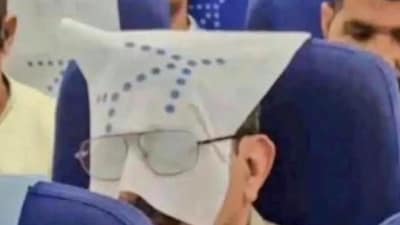 The Indigo passenger wore a pair of spectacles over the headrest cover. (X/@outofofficedaku) The Indigo passenger wore a pair of spectacles over the headrest cover. (X/@outofofficedaku)
