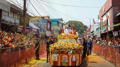 **EDS: IMAGE VIA @narendramodi** Palakkad: Prime Minister Narendra Modi waves at supporters during a roadshow ahead of Lok Sabha elections, in Palakkad, Kerala, Tuesday, March 19, 2024. (PTI Photo)(PTI03_19_2024_000128B) (PTI) **EDS: IMAGE VIA @narendramodi** Palakkad: Prime Minister Narendra Modi waves at supporters during a roadshow ahead of Lok Sabha elections, in Palakkad, Kerala, Tuesday, March 19, 2024. (PTI Photo)(PTI03_19_2024_000128B) (PTI)