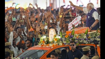 Prime Minister Narendra Modi waves at supporters as he arrives for a public meeting ahead of Lok Sabha elections, in Salem. (PTI) Prime Minister Narendra Modi waves at supporters as he arrives for a public meeting ahead of Lok Sabha elections, in Salem. (PTI)