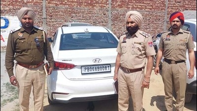 The car sped away after breaking a police checkpost at Tehsil Chowk in Jagraon city. (HT Photo)