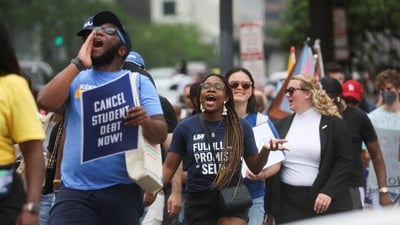 FILE PHOTO: Supporters of U.S. President Joe Biden's s plans for student debt relief march near the White House after a U.S. Supreme Court decision blocking the president's plan to cancel $430 billion in student loan debt, in Washington, U.S. June 30, 2023. REUTERS/Leah Millis/File Photo (REUTERS)