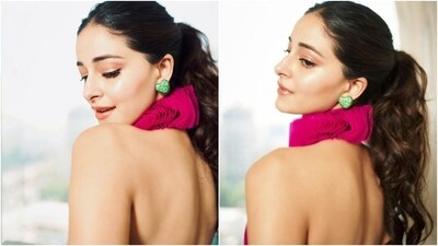 Ananya styled the ensemble with striking accessories, including statement gold rings, heart-shaped ear studs featuring emerald stones, and high heels. Lastly, she chose a centre-parted messy ponytail, feathered brows, muted peach eye shadow, winged eyeliner, mascara on the lashes, blush on the cheekbones, caramel lip gloss, and beaming highlighter on the contours for the glam. (Instagram) Ananya styled the ensemble with striking accessories, including statement gold rings, heart-shaped ear studs featuring emerald stones, and high heels. Lastly, she chose a centre-parted messy ponytail, feathered brows, muted peach eye shadow, winged eyeliner, mascara on the lashes, blush on the cheekbones, caramel lip gloss, and beaming highlighter on the contours for the glam. (Instagram)