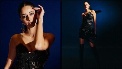 Ananya's black dress features a strapless silhouette, a sweetheart neckline, leaf and flower applique embroidered on the side, sequin and bead embellishments, a body-hugging fitting, and a mini hem length. She styled the ensemble with thigh-high black leather boots featuring high heels. (Instagram) Ananya's black dress features a strapless silhouette, a sweetheart neckline, leaf and flower applique embroidered on the side, sequin and bead embellishments, a body-hugging fitting, and a mini hem length. She styled the ensemble with thigh-high black leather boots featuring high heels. (Instagram)