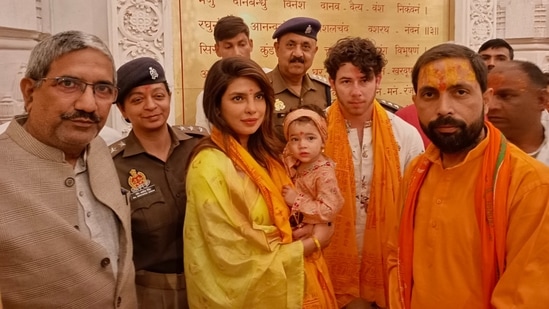 Priyanka Chopra and Nick Jonas with daughter Malti at Ram Mandir in Ayodhya. (ANI)
