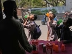 School children drink water at a roadside stall distributing free drinking water next to a bus stand in Hyderabad, India, Wednesday, March 22, 2017. People in many parts of India provide free drinking water to commuters during summer months. Friday marks the World Water Day. (AP Photo/Mahesh Kumar A.) School children drink water at a roadside stall distributing free drinking water next to a bus stand in Hyderabad, India, Wednesday, March 22, 2017. People in many parts of India provide free drinking water to commuters during summer months. Friday marks the World Water Day. (AP Photo/Mahesh Kumar A.)