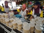 Libyan volunteers cook 300 free meals daily for Ramadan fasting.