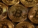 FILE PHOTO: Representations of cryptocurrency Bitcoin are seen in this illustration, August 10, 2022. REUTERS/Dado Ruvic/Illustration/File Photo/File Photo