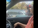 Peak Bengaluru: Boss and colleague turned the wait time at the traffic signal into a brainstorming session. Peak Bengaluru: Boss and colleague turned the wait time at the traffic signal into a brainstorming session.