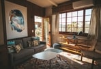 Transform your living space into a gallery of personal expression with statement artworks.