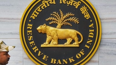 A security official walks past an emblem of the Reserve Bank of India at the RBI headquarters, in Mumbai. Here's full list of agency banks in India which will be open on Sunday, March 31. A security official walks past an emblem of the Reserve Bank of India at the RBI headquarters, in Mumbai. Here's full list of agency banks in India which will be open on Sunday, March 31.