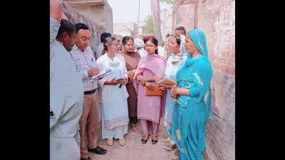 Health department officials during a door-to-door survey after the hooch tragedy at Jakhepal Chowas village in Sangrur. (HT Photo) Health department officials during a door-to-door survey after the hooch tragedy at Jakhepal Chowas village in Sangrur. (HT Photo)