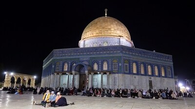 Worshippers hold the evening Taraweeh prayer of Ramadan in Al-Aqsa compound, also known to Jews as the Temple Mount, in Jerusalem's Old City. (REUTERS)