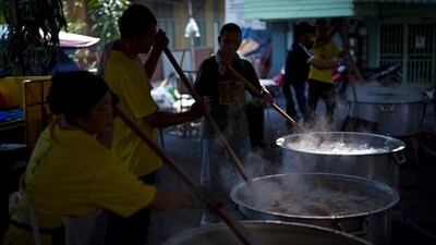 Malaysian Muslims cook large pots of Bubur Lambuk porridge in the Kampung Baru village in Kuala Lumpur, Malaysia. Bubur Lambuk is a type of Malay rice porridge that is cooked and distributed in many places during the fasting month of Ramadan. (AP) Malaysian Muslims cook large pots of Bubur Lambuk porridge in the Kampung Baru village in Kuala Lumpur, Malaysia. Bubur Lambuk is a type of Malay rice porridge that is cooked and distributed in many places during the fasting month of Ramadan. (AP)