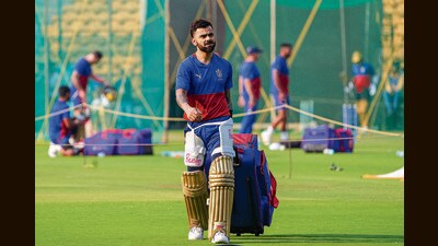 Royal Challengers Bangalore player Virat Kohli during a training session ahead of the Indian Premier League (IPL) 2024 cricket tournament, at M. Chinnaswamy Stadium in Bengaluru, on Tuesday. (PTI) Royal Challengers Bangalore player Virat Kohli during a training session ahead of the Indian Premier League (IPL) 2024 cricket tournament, at M. Chinnaswamy Stadium in Bengaluru, on Tuesday. (PTI)
