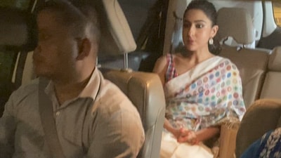 Giving dresses a skip, Sara Ali Khan opted for a white saree with colourful detailing. Giving dresses a skip, Sara Ali Khan opted for a white saree with colourful detailing.