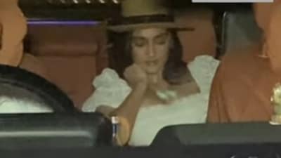 Sonam Kapoor opted for a white dress and a star hat as she made a rare appearance. Sonam Kapoor opted for a white dress and a star hat as she made a rare appearance.