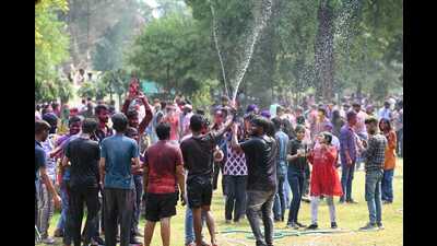 Students playing Holi at Lucknow University on Thursday (HT photo) Students playing Holi at Lucknow University on Thursday (HT photo)