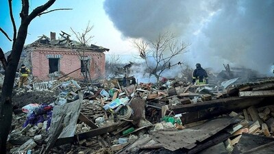 Rescuers work at a site of private houses destroyed during a Russian missile attack, (via REUTERS)