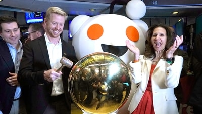 Reddit CEO Steve Huffman and New York Stock Exchange (NYSE) president Lynn Martin ring the opening bell during the bell-ringing ceremony as Reddit begins trading on the New York Stock Exchange (NYSE) in New York on March 21, 2024. (AFP) Reddit CEO Steve Huffman and New York Stock Exchange (NYSE) president Lynn Martin ring the opening bell during the bell-ringing ceremony as Reddit begins trading on the New York Stock Exchange (NYSE) in New York on March 21, 2024. (AFP)
