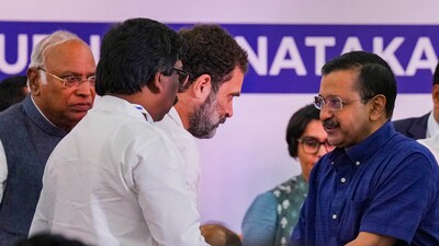 Congress leader Rahul Gandhi greets Delhi CM Arvind Kejriwal during a joint press conference in Bengaluru. (PTI / File)