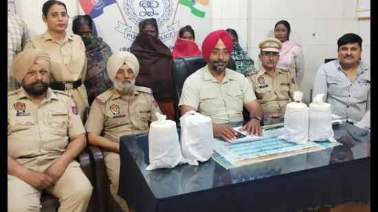 The accused in custody of police in Ludhiana on Thursday. (HT Photo)