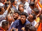 BJP MP Tejasvi Surya and Shobha Karandlaje participated in the protest after the shopkeeper's assault case, and were detained later by police. (PTI Photo)