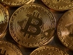 Representations of cryptocurrency Bitcoin are seen in this illustration. Despite Bitcoin setting a record of almost $73,798 on March 14, enthusiasm among retail traders may be waning.