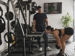 The couple claims to have together shed 56 pounds since they started working out nude.  