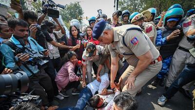 AAP leader Atishi being detained during the protest on Friday. (Sanchit Khanna/HT Photo) AAP leader Atishi being detained during the protest on Friday. (Sanchit Khanna/HT Photo)