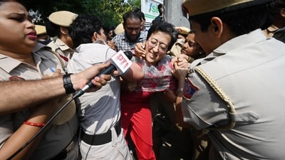 AAP leader Atishi being detained during their protest against the arrest of AAP leader and Delhi's Chief Minister Arvind Kejriwal, at ITO Chowk in New Delhi, India, on Friday, March 22, 2024. (Photo by Sanchit Khanna Hindustan Times) AAP leader Atishi being detained during their protest against the arrest of AAP leader and Delhi's Chief Minister Arvind Kejriwal, at ITO Chowk in New Delhi, India, on Friday, March 22, 2024. (Photo by Sanchit Khanna Hindustan Times)