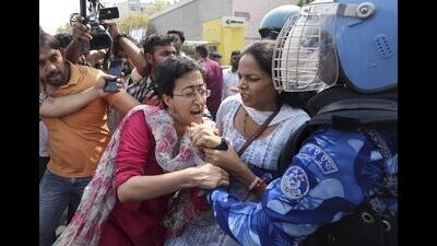 Delhi minister Atishi was detained during a protest at ITO against the arrest of CM Arvind Kejriwal by the ED (PTI Photo) Delhi minister Atishi was detained during a protest at ITO against the arrest of CM Arvind Kejriwal by the ED (PTI Photo)