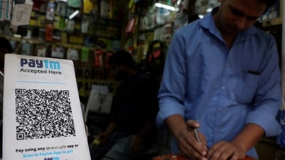 A QR code of Paytm is seen at a mobile repairing shop in Kolkata, India. (Reuters)