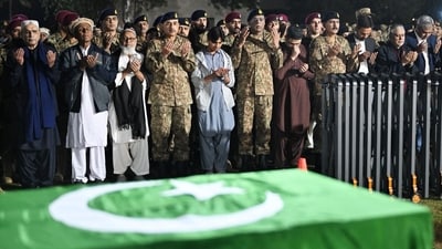 President of Pakistan Asif Ali Zardari, Chief of Army Staff (COAS) of Pakistan Asim Munir, and General Sahir Shamshad Mirza, Chairman Joint Chiefs of Staff Committee (JCSC), along with others attend the funeral of Lieutenant Colonel Syed Kashif Ali, 39 and Captain Muhammad Ahmed Badar, 23, after according to the military, militants attacked a military post in Mir Ali, North Waziristan district in Pakistan near Afghanistan early on Saturday using a vehicle laden with explosives as well as suicide bombs, during the funeral at Chaklala Garrison, Rawalpindi, Pakistan March 17, 2024. Inter-Services Public Relations (ISPR)/Handout via REUTERS (via REUTERS)