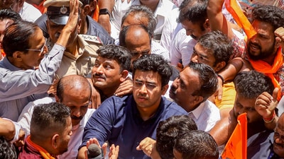 BJP MP Tejasvi Surya and Shobha Karandlaje participated in the protest after the shopkeeper's assault case, and were detained later by police. (PTI Photo)
