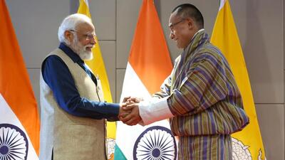 Prime Minister Narendra Modi met his Bhutanese counterpart Tshering Tobgay in Bhutan on Friday (Twitter/@narendramodi) Prime Minister Narendra Modi met his Bhutanese counterpart Tshering Tobgay in Bhutan on Friday (Twitter/@narendramodi)