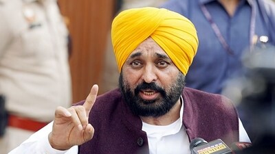 Punjab CM Bhagwant Mann speaks to the media on the arrest of Delhi CM and Aam Aadmi Party (AAP) national convener Arvind Kejriwal by the Enforcement Directorate (ED) in an alleged irregularity in the now-scrapped liquor policy scam, outside the CM's residence, in New Delhi on Friday. (ANI) Punjab CM Bhagwant Mann speaks to the media on the arrest of Delhi CM and Aam Aadmi Party (AAP) national convener Arvind Kejriwal by the Enforcement Directorate (ED) in an alleged irregularity in the now-scrapped liquor policy scam, outside the CM's residence, in New Delhi on Friday. (ANI)