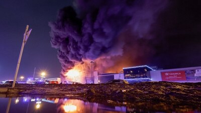 Smoke from fire rises above the burning Crocus City Hall concert venue following a shooting incident, outside Moscow, Russia, March 22, 2024. REUTERS/Maxim Shemetov (REUTERS)