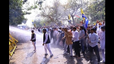 The Haryana unit of the Aam Aadmi Party (AAP) staged a protest against the arrest of party supremo Arvind Kejriwal, as the state police used water cannons and lathi-charged the protesters who tried to gherao Haryana chief minister Nayab Singh Saini’s residence in Kurukshetra on Friday. (HT Photo) The Haryana unit of the Aam Aadmi Party (AAP) staged a protest against the arrest of party supremo Arvind Kejriwal, as the state police used water cannons and lathi-charged the protesters who tried to gherao Haryana chief minister Nayab Singh Saini’s residence in Kurukshetra on Friday. (HT Photo)