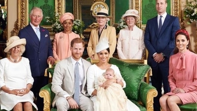 This official handout Christening photograph released by the Duke and Duchess of Sussex shows Britain's Prince Harry, Duke of Sussex (centre left), and his wife Meghan, Duchess of Sussex holding their baby son, Archie Harrison Mountbatten-Windsor flanked by (L-R) Britain's Camilla, Duchess of Cornwall, Britain's Prince Charles, Prince of Wales, Ms Doria Ragland, Lady Jane Fellowes, Lady Sarah McCorquodale, Britain's Prince William, Duke of Cambridge, and Britain's Catherine, Duchess of Cambridge in the Green Drawing Room at Windsor Castle, west of London on July 6, 2019. (AFP) This official handout Christening photograph released by the Duke and Duchess of Sussex shows Britain's Prince Harry, Duke of Sussex (centre left), and his wife Meghan, Duchess of Sussex holding their baby son, Archie Harrison Mountbatten-Windsor flanked by (L-R) Britain's Camilla, Duchess of Cornwall, Britain's Prince Charles, Prince of Wales, Ms Doria Ragland, Lady Jane Fellowes, Lady Sarah McCorquodale, Britain's Prince William, Duke of Cambridge, and Britain's Catherine, Duchess of Cambridge in the Green Drawing Room at Windsor Castle, west of London on July 6, 2019. (AFP)