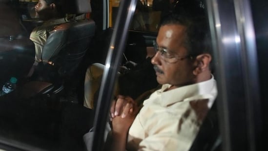 Delhi chief minister Arvind Kejriwal being taken away by ED following his arrest on Thursday. (HT Photo)
