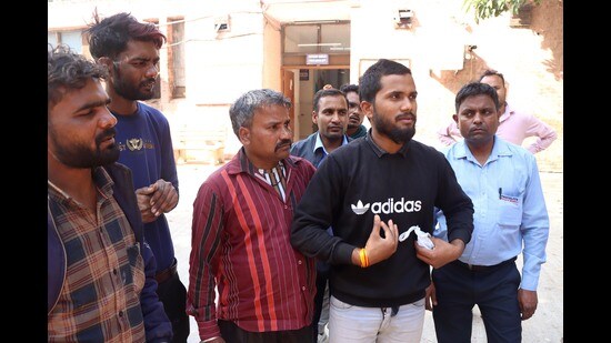Family members of a victim wait for his body at the PGIMS mortuary in Rohtak on Friday. (Manoj Dhaka/HT)