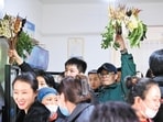 Customers hold on to their chosen ingredients at a crowded malatang restaurant in Tianshui, Gansu province. Viral video to tourist magnet: Tianshui's spicy Malatang craze takes China by storm, sparks tourism frenzy 