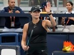 Aryna Sabalenka, of Belarus, waves after defeating Paula Badosa, of Spain, at the Miami Open tennis tournament