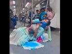Snapshot of the women putting holi colours on each other. Snapshot of the women putting holi colours on each other.