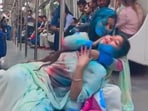Snapshot of the women putting holi colours on each other inside Delhi metro Snapshot of the women putting holi colours on each other inside Delhi metro